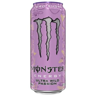 Cans of Monster Ultra Wild Passion energy drink with vibrant branding and colorful packaging, displayed in a retail setting.