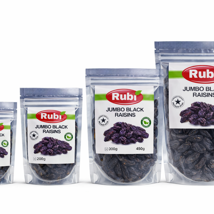 Jumbo black raisins in a clear glass bowl, showcasing large, dark, glossy grapes from The Fusion Mart UK.