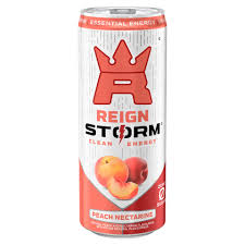 Reign Storm Peach energy drink can with vibrant peach design and branding, standing upright on a white background.
